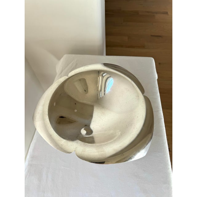 This elegant Tiffany & Co. sterling silver platter (often described as a petal bowl or flower-form dish) showcases a...