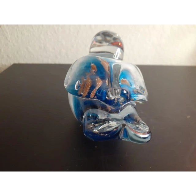 It is Murano multicolor Glass Bird figurine. Beautiful colors, sommerso & clear polished pontil. Great decor piece....