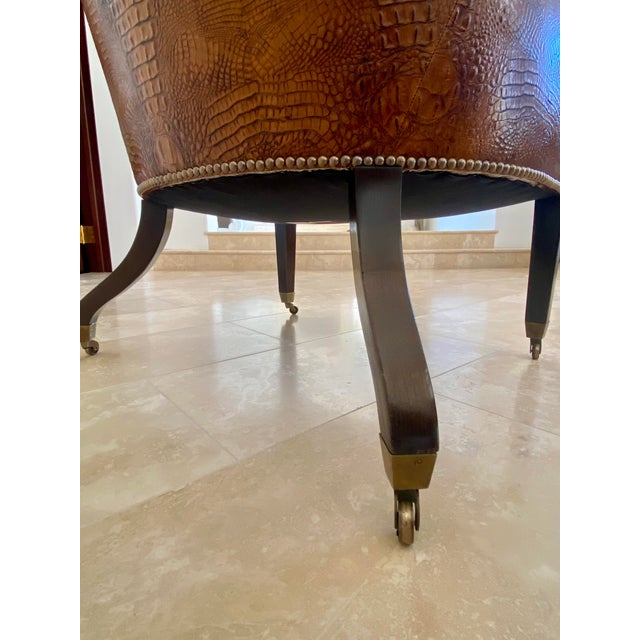 An exceptional piece of luxury American furniture design, this dramatic wingback statement chair is crafted by the...
