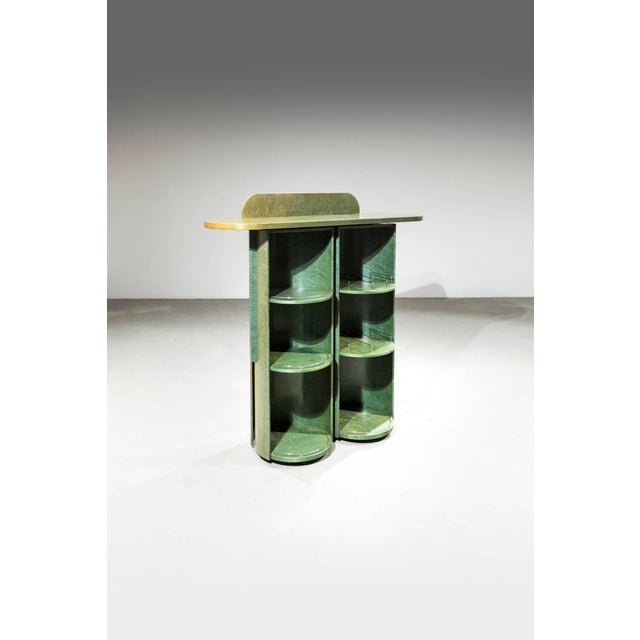 Rare sideboard/bar cabinet. Lacquered wood frame, steel details, and burl veneer. Manufacturer's label: Saporiti, Italy,...