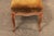 A French upholstered smaller-sized bench from the 19th century. This antique bench from France, just shy of 3 feet in...