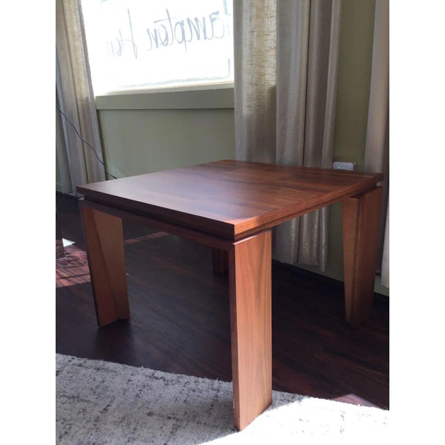 Walnut inlay end table in a matte finish. Angled legs with reveal below top.