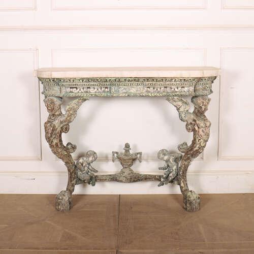 Really funky early 19th century Italian carved pine console table with a 1.5-inch thick faux marble top. 1820. This piece...