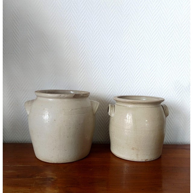 Two antique preserve pots or fat pots, typical of the late 19th or early 20th century. Double side handles. Beautifully...