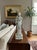 Exquisitely rendered in a luminous pale off white glaze, this graceful porcelain figurine depicts a serene celestial...