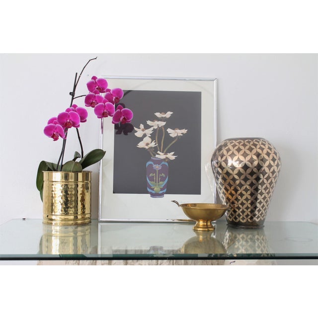 Beautiful Mid-Century brass vase with a Moroccan style design. Add fresh or dried floral arrangements for a show stopping...
