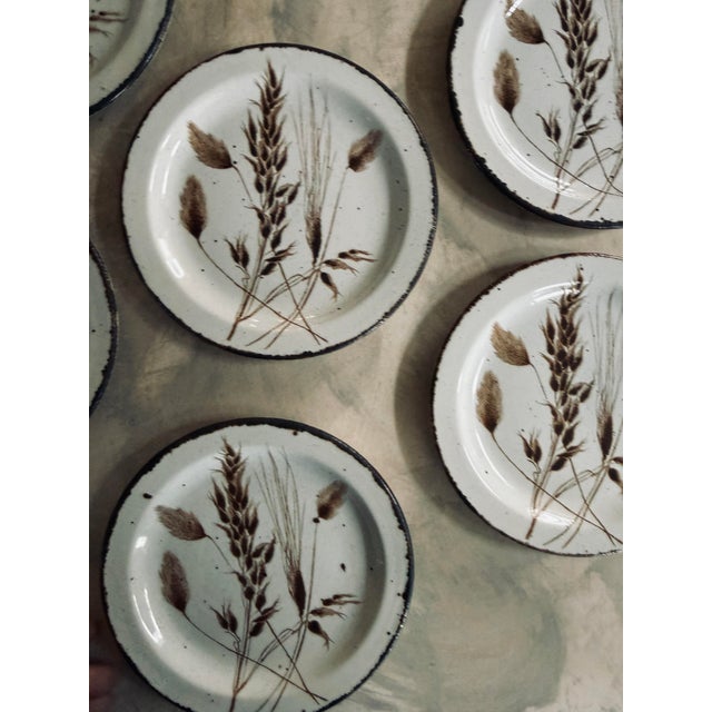 A classic set of six Midwinter Stonehenge Wild Oats salad plates, made in England. This iconic 1970s pattern features warm...