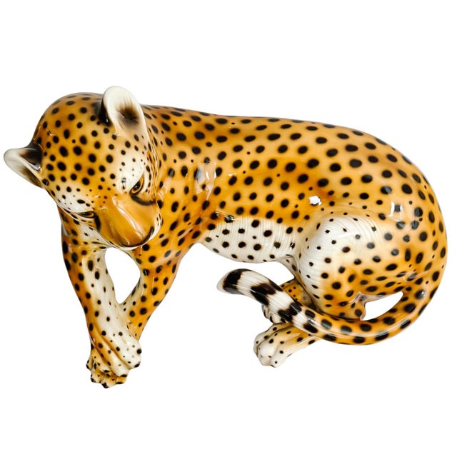 A fantastic vintage Italian glazed ceramic reclining leopard statue. This is a very realistic hand-made and hand-painted...