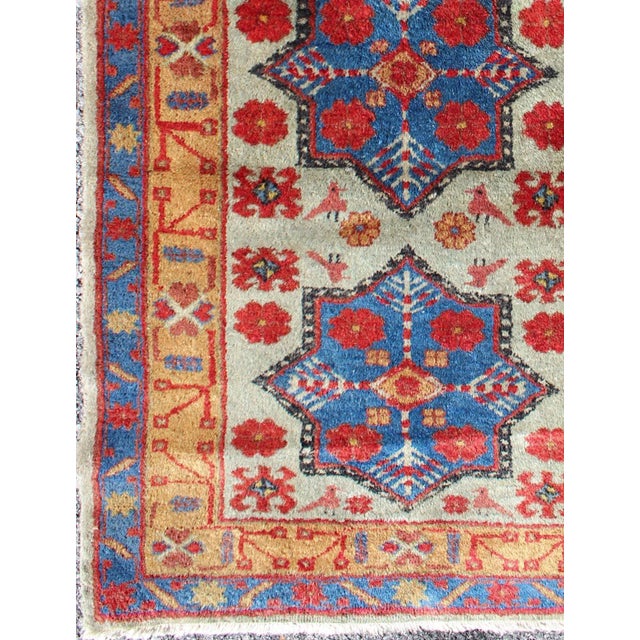 Measures: 2.4 x 4.5. Vintage Turkish Rug with Star Design in light Green, Orange, Red & Blue. Mid century Turkish rug with...