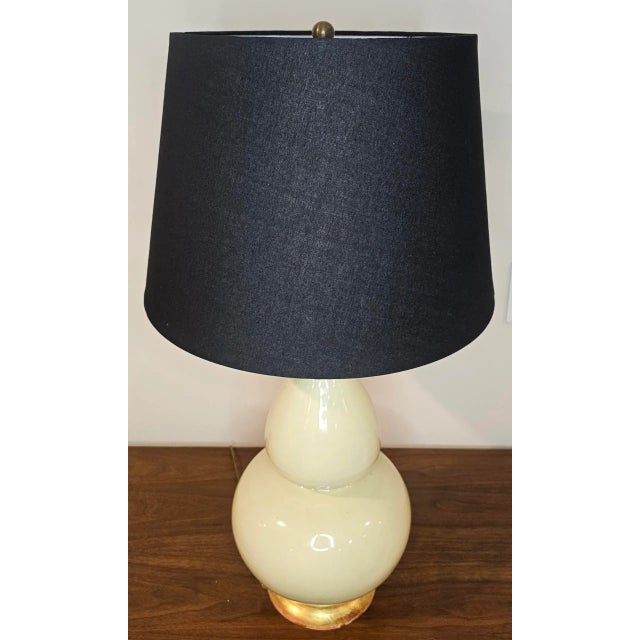 This Christopher Spitzmiller Aurora Table Lamp, crafted in 2000, is a lovely ceramic fusion of modern and classic design....