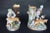 Each vase features exquisite hand-painted hunting dog figures, capturing the grace and power of these noble animals. The...