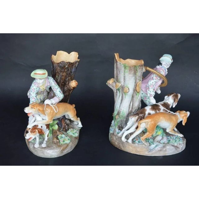 Each vase features exquisite hand-painted hunting dog figures, capturing the grace and power of these noble animals. The...