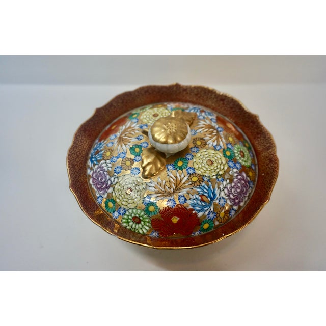 A breathtaking vintage Japanese Kutani porcelain lidded bowl featuring the intricate and highly sought-after "Thousand...
