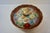 A breathtaking vintage Japanese Kutani porcelain lidded bowl featuring the intricate and highly sought-after "Thousand...