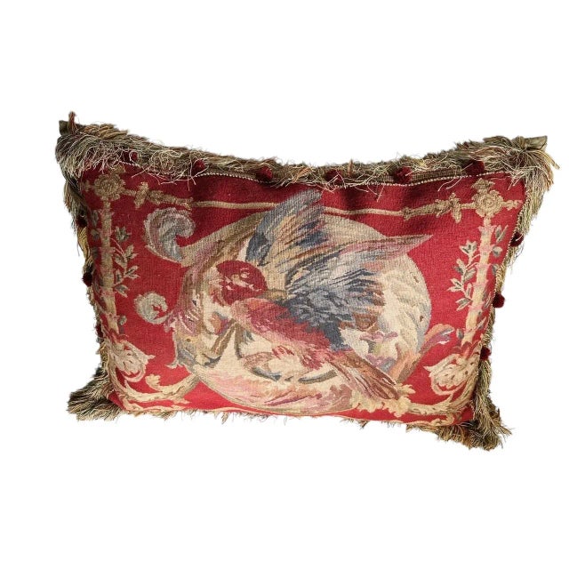 Aubusson style needlepoint bird pillow with fringe and red pom poms around the pillow fringe. Very well stuffed and fells...
