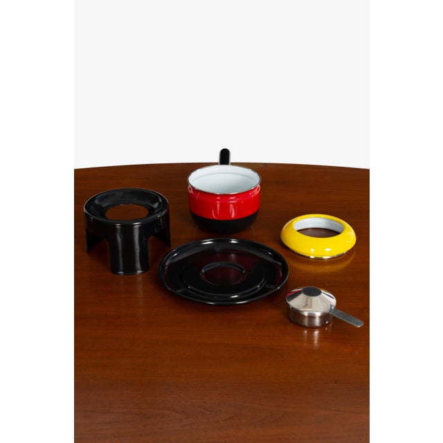 Carl Auböck III Fondue set, by Riess: Enameled steel, stainless steel, Austria, circa 1980 Signed underside.