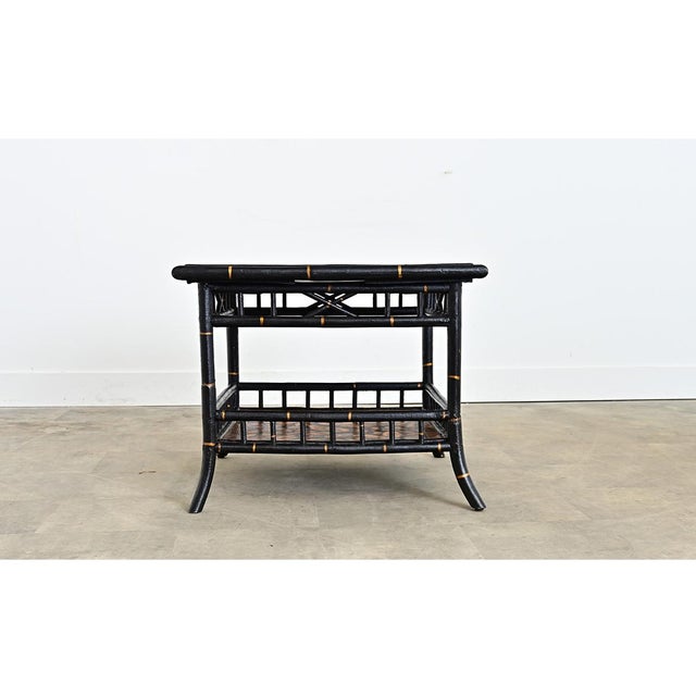 English, late 19th century faux bamboo coffee or end table that has been recently updated with new paint of ebonized...