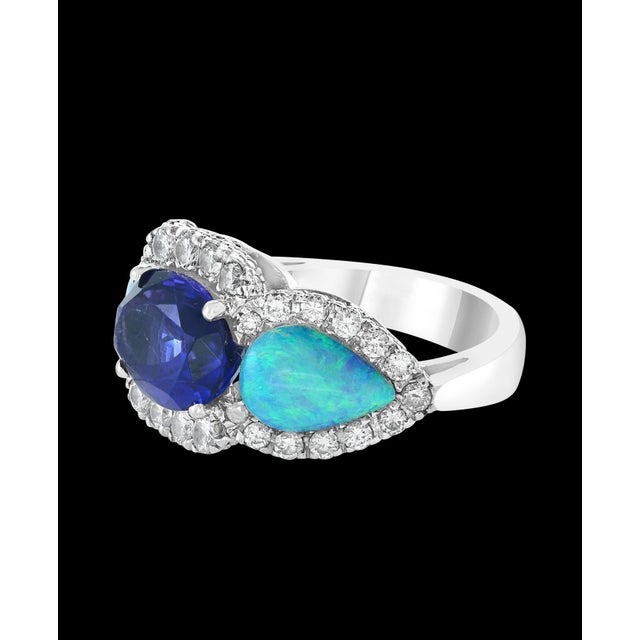 Contemporary 5 Carat Oval Tanzanite, Diamond and Opal Ring 14 Karat White Gold, Estate For Sale - Image 3 of 18