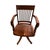 Antique oak captain's chair. The chair is adjustable in height by a spindle wich also makes it possible to swivel. The...