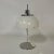 White Faro table lamp designed by Guzzini design team led by Luigi Massoni for Italian manufacturer Harvey Guzzini in...