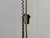 Characterful vintage HALO 250 floor lamp by Baltensweiler, Ebikon, in a high-quality brass finish. The lamp combines a...