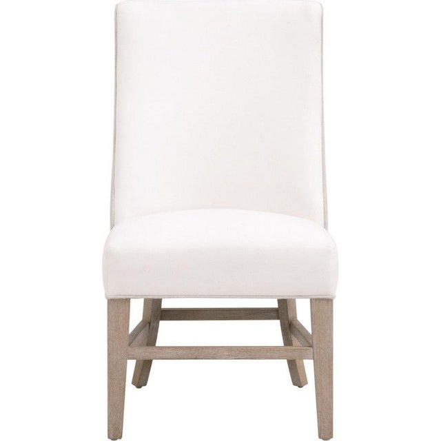 The elegant Duet Head Chair by Essentials For Living features a visually appealing two-tone design that is unique and sure...