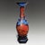 A monumental Japanese Arita vase dating to the Edo period, combining porcelain with decorative lacquer work and standing...