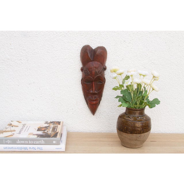 This charming Kwele mask from Gabon or the Republic of Congo is a delightful example of African tribal art. The mask is...