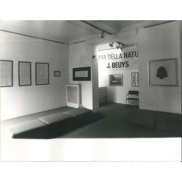 Beuys' Exhibition is an original b/w photograph representing the indoor of the Marino Gallery (in Mignanelli Square, Rome)...