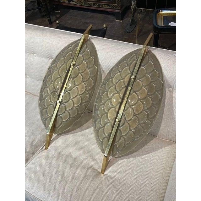 Pair of Modern Murano glass "turtle shell" sconces Circa 2000. The sconces are wired and ready to hang. They have great...