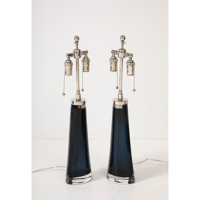 Stunning pair of Midnight blue crystal lamps designed by Carl Fagerlund for Orrefors. The lamps have been Newly rewired...