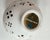 Jonathan Adler Gold Dot Futura Atomic Starburst Vase 7” porcelain vase features a white base with a geometric gold dot...