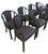 This listing is for a set of eight Vintage Italian Modern Black Lacquered Dining Chairs. Elevate your dining space with...