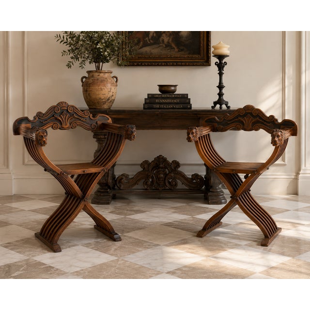 Striking pair of vintage Renaissance Revival Savonarola chairs featuring sculptural folding X-form frames, beautifully...