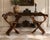 Striking pair of vintage Renaissance Revival Savonarola chairs featuring sculptural folding X-form frames, beautifully...