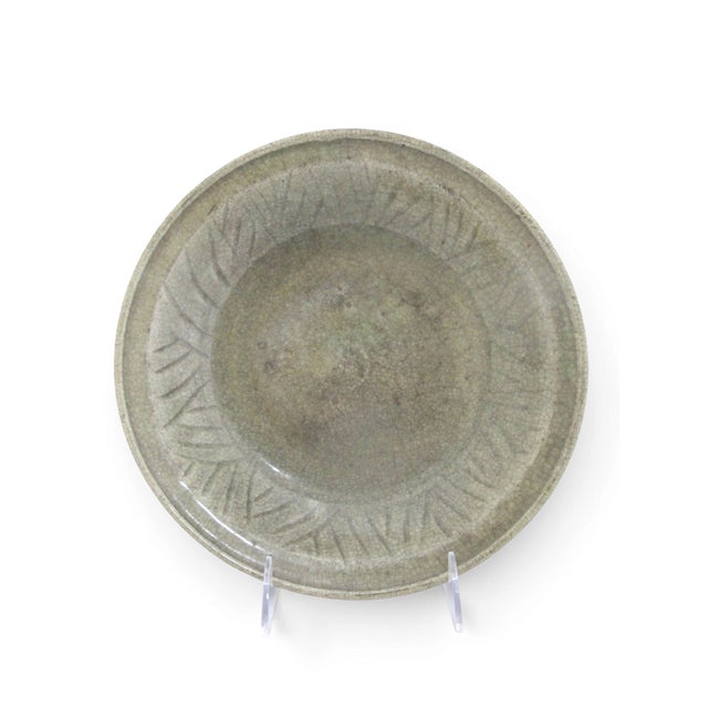 Antique Sawankhalok style Celadon bowl, originating from Thailand. This piece is in the style of 14th to 15th century...
