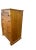 Tall pine chest that contains 5 drawers. A transitional piece from the years 2000-2009.