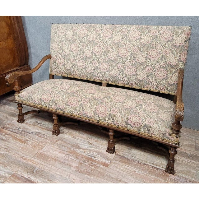 Louis XIII style walnut château bench, circa 1850 antique upholstery armrests carved with acanthus leaves the whole rests...