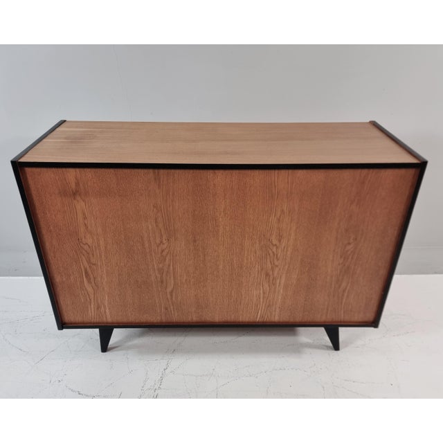 Vintage Commode by Jiri Jiroutek for Tatra, 1970s, in Flawless conditions. Designed 1970 to 1979 This piece has an...