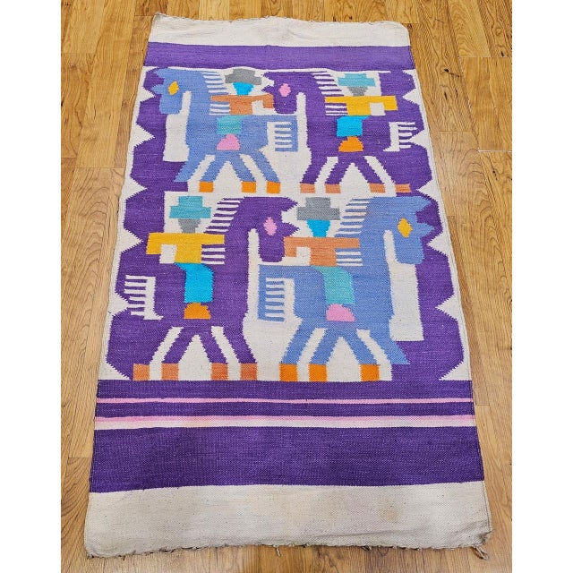 Celebrate the spirit of the American Southwest with this vintage pictorial kilim area rug, handwoven in the late 20th...