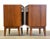 A pair of mid century modern teak nightstands with a single drawer and a lower shelf. Professionally refinished. 22” wide....