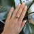 A natural purple garnet glows in a rich grape-purple at the centre of this solid 14K yellow gold estate ring. Untreated...