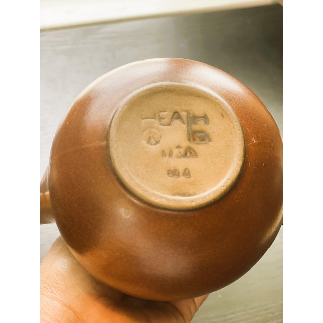 Designed by celebrated ceramicist Edith Heath, this 1950s Heath Ceramics teapot captures the quiet beauty and restrained...