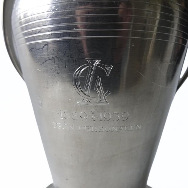 Large antique art deco pewter/tin urn with two handles. Stamped under gab tenn (gab tin) with engravings: "cl 1889 - 1939...