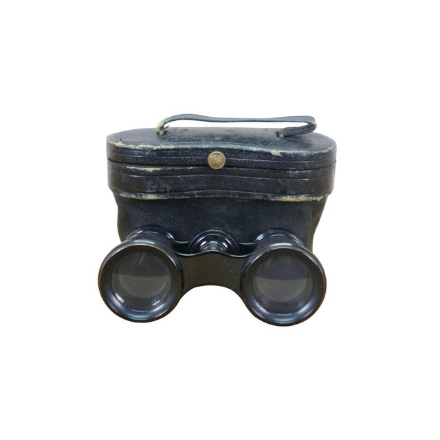 Circa late 19th century pair of Lemaire opera glasses / binoculars. Leather wrapped black enamel over brass. Sold by H.D....