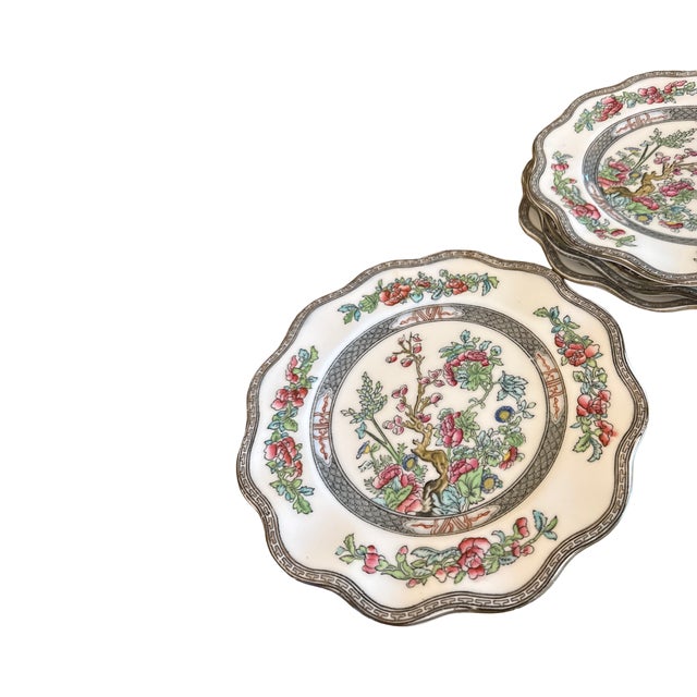 An elegant set of five antique Coalport Indian Tree luncheon plates, beautifully crafted in fine English bone china and...