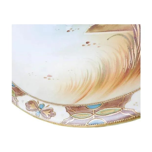 Porcelain platter with hand-painted canal scene, circa 1910. Maker's mark reads: "Nippon Hand Painted." Very good, some wear.