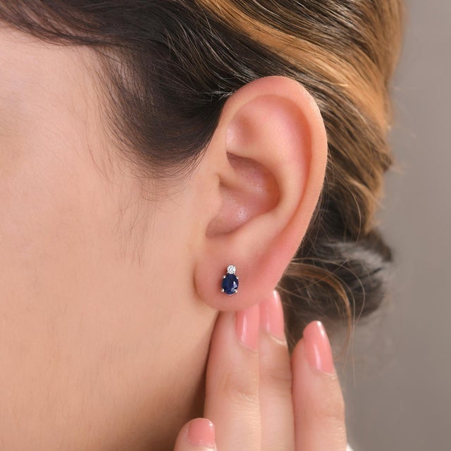 Minimalist Blue Sapphire Diamond Stud Earrings Gift for Her in 14K Gold to make a statement with your look. You shall need...
