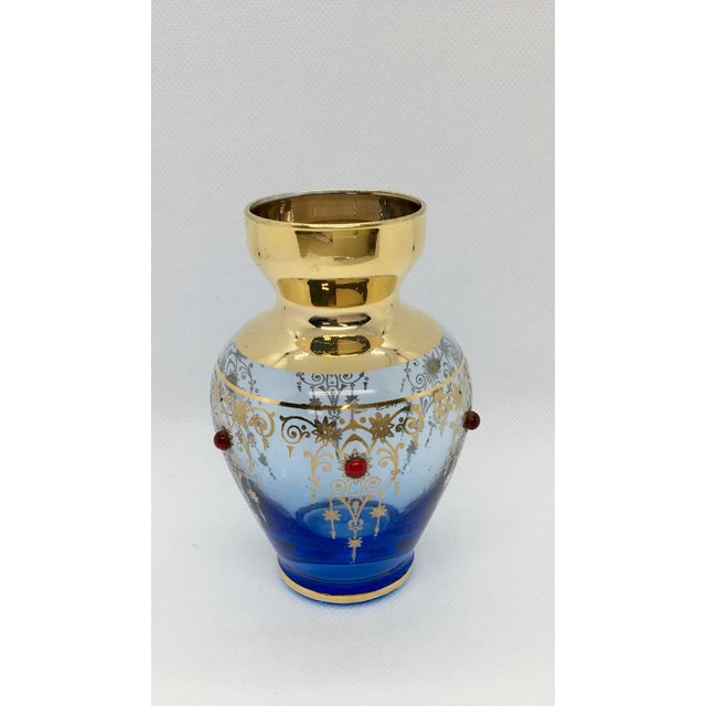 This colorful set of 4 Bohemian Style vases are a beautiful addition wherever you would like to add a splash of color to...