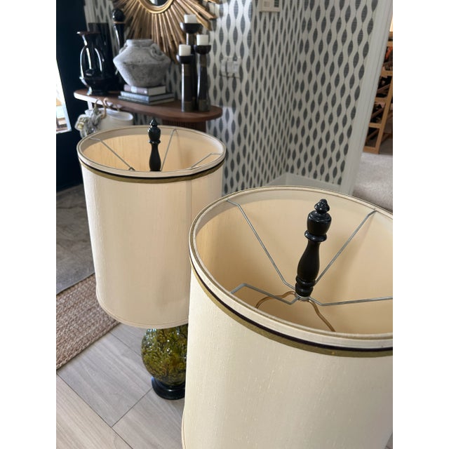 Vintage (60’s or 70’s) green tall porcelain table lamps with original shades and finials. Super tall pair of mid century...